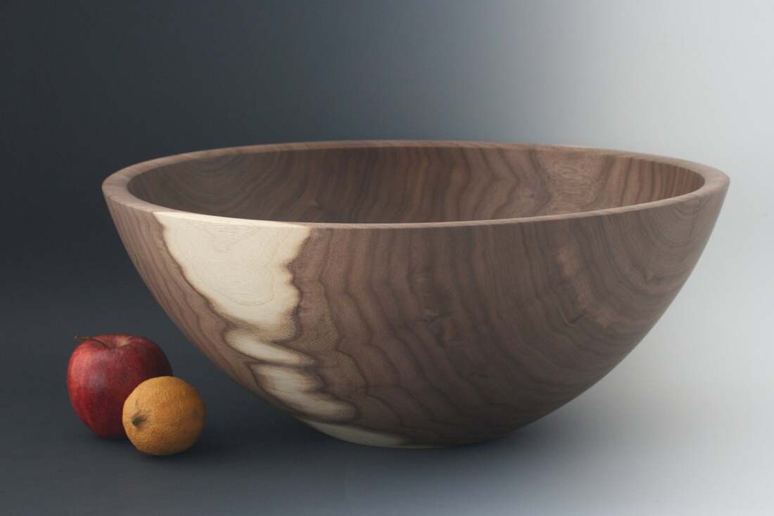 Large walnut wooden serving bowls made in Minnesota.
