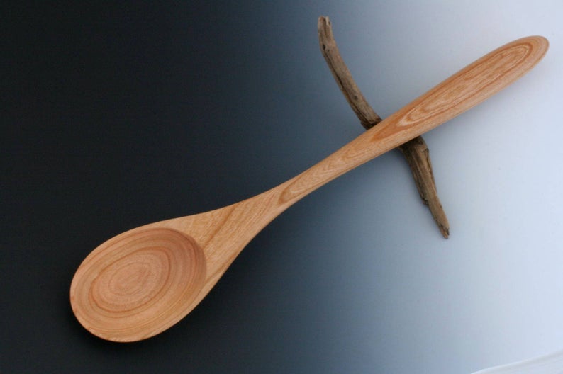 Handmade classically shaped cherry wood spoon.