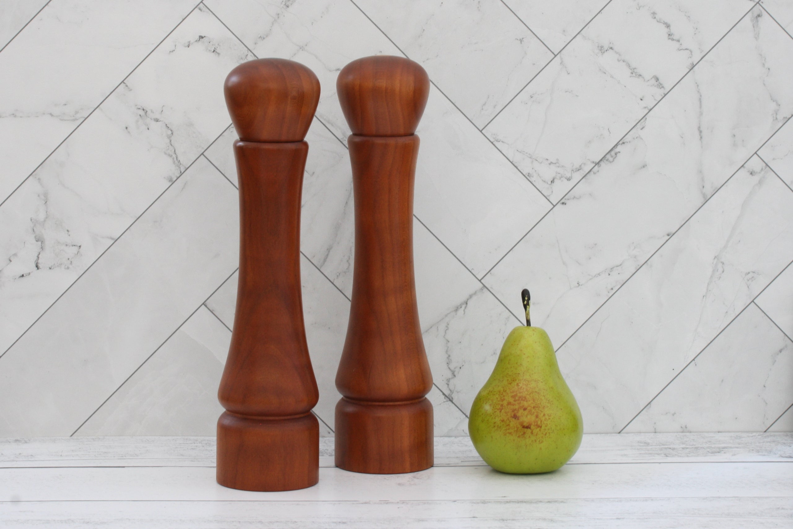 Cherry wood large salt and pepper grinders with ceramic grinders.