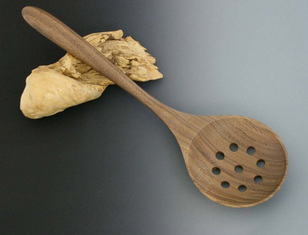 Handmade walnut wood large holed colander or skimming spoon.