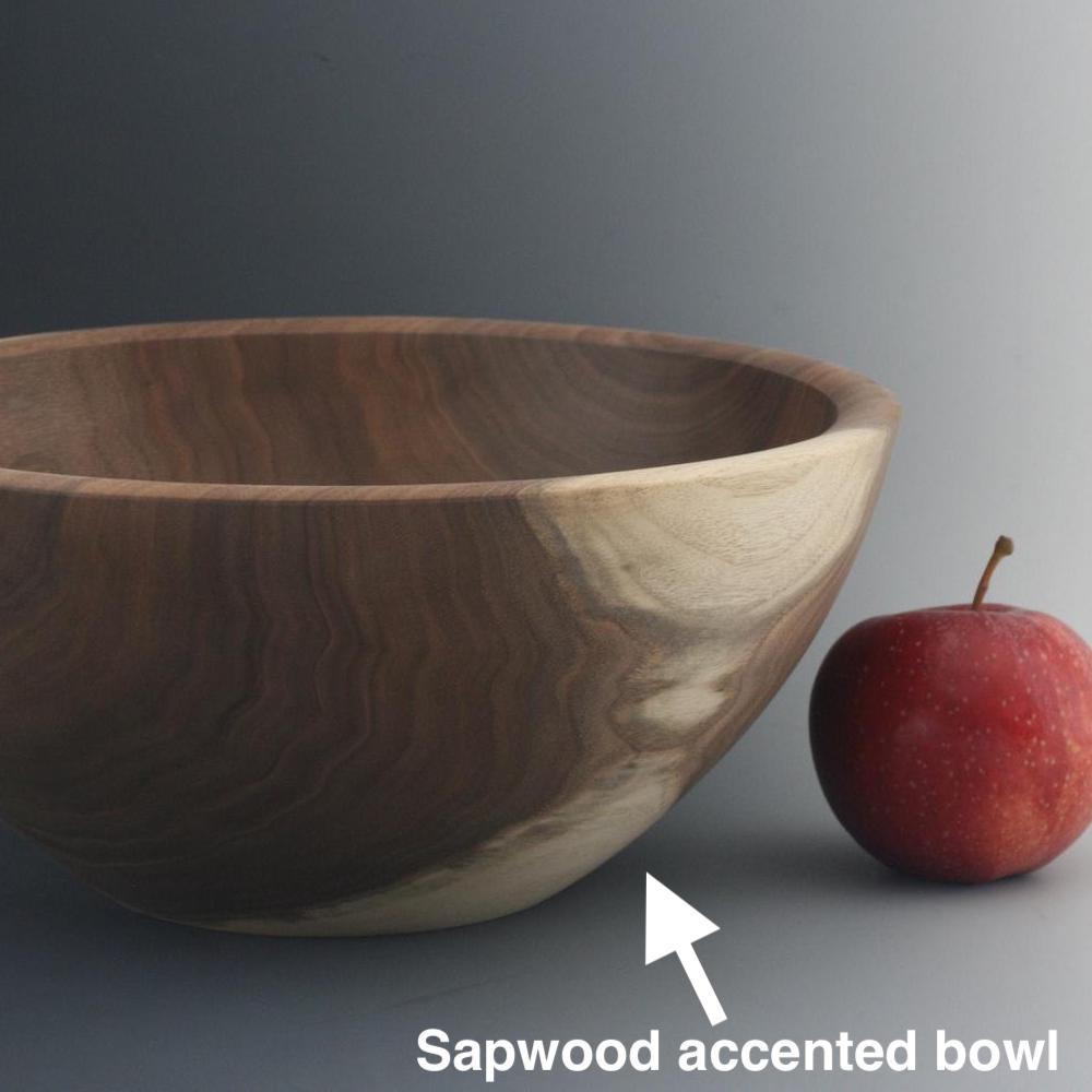 Walnut wood bowl, wood turned with sapwood accent.