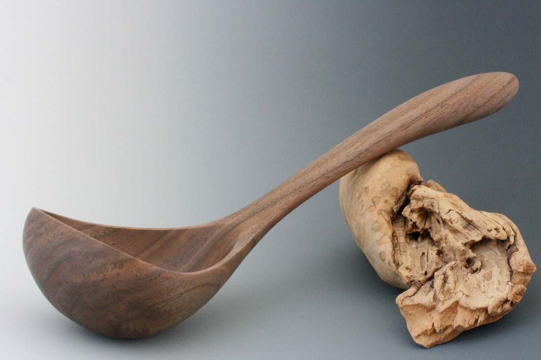 Unique walnut wood soup ladle.